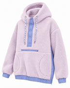 Angled view of the light purple sherpa pullover hoodie showing the hood, snap neckline, front pockets, and periwinkle blue side panel
