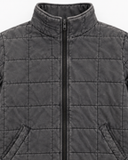 Close-up of Charcoal Garment Washed Quilted Jacket showing stand-up collar, black zipper pull, and charcoal washed quilted grid stitching detail on white background
