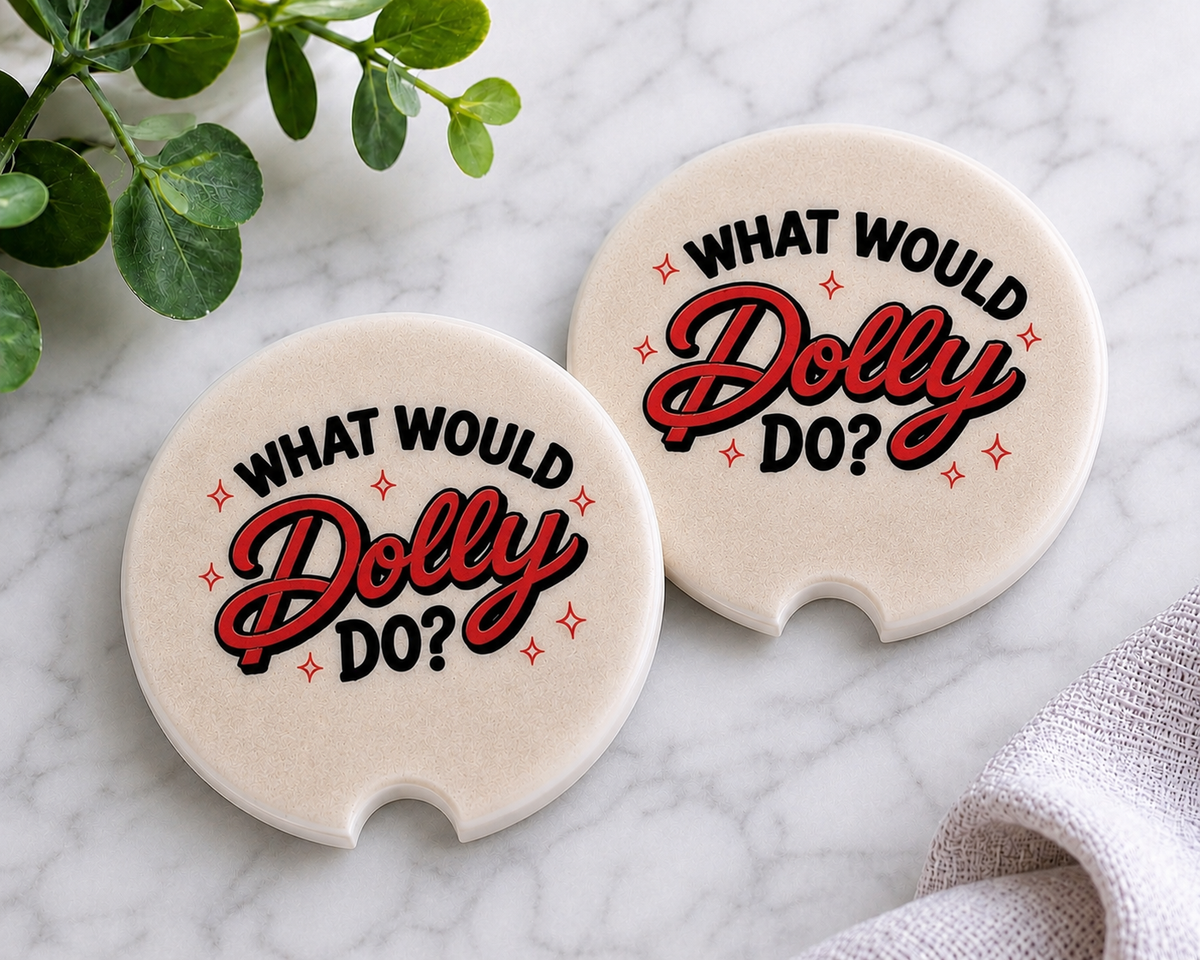 What Would Dolly Do? Car Coaster Set — set of 2 ceramic coasters with bold red and black "What Would Dolly Do?" lettering and sparkle accents on cream background, on marble surface
