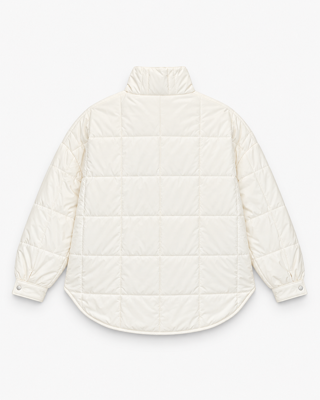 Back view of the white quilted puffer pullover jacket showing its gathered snap-button cuffs.
