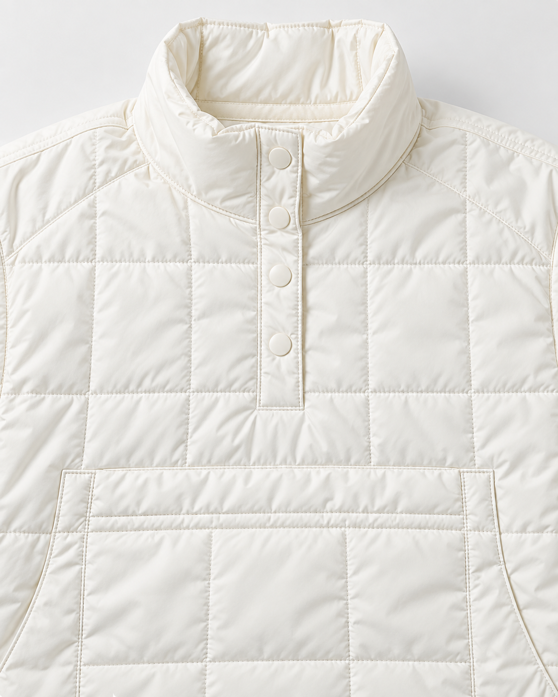 Close-up of the white puffer jacket's stand-up collar and four white dome snaps.
