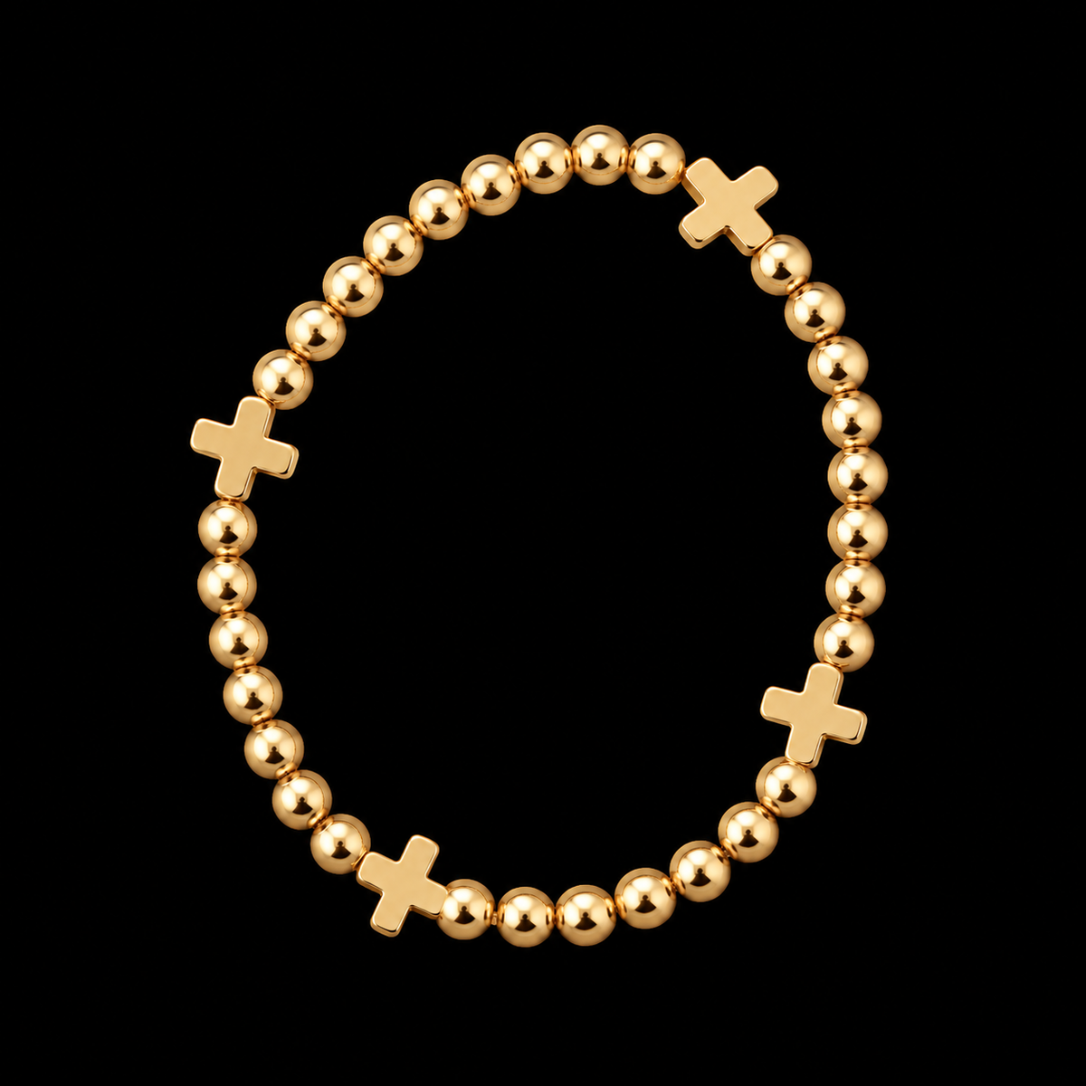 Gold cross beaded stretch bracelet with polished gold-tone round beads and four gold cross accents displayed flat in a circle on black background
