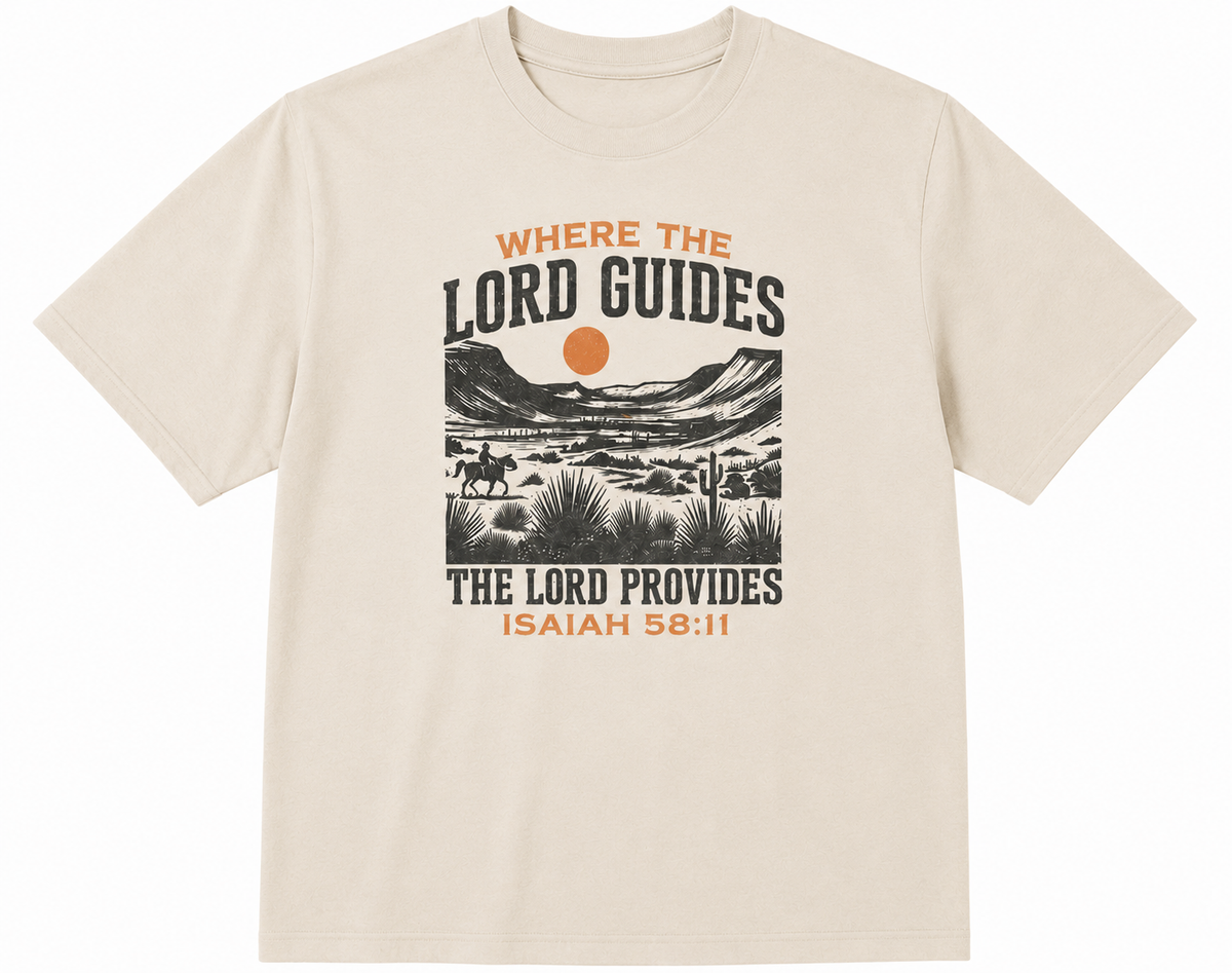 Cream Where The Lord Guides Graphic Tee featuring a vintage Western desert scene and Isaiah 58:11 scripture.