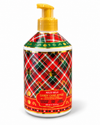 Angled view of the Candy Cane Apple hand soap bottle showing its plaid decoration, apple motifs, gold accents, and pump dispenser
