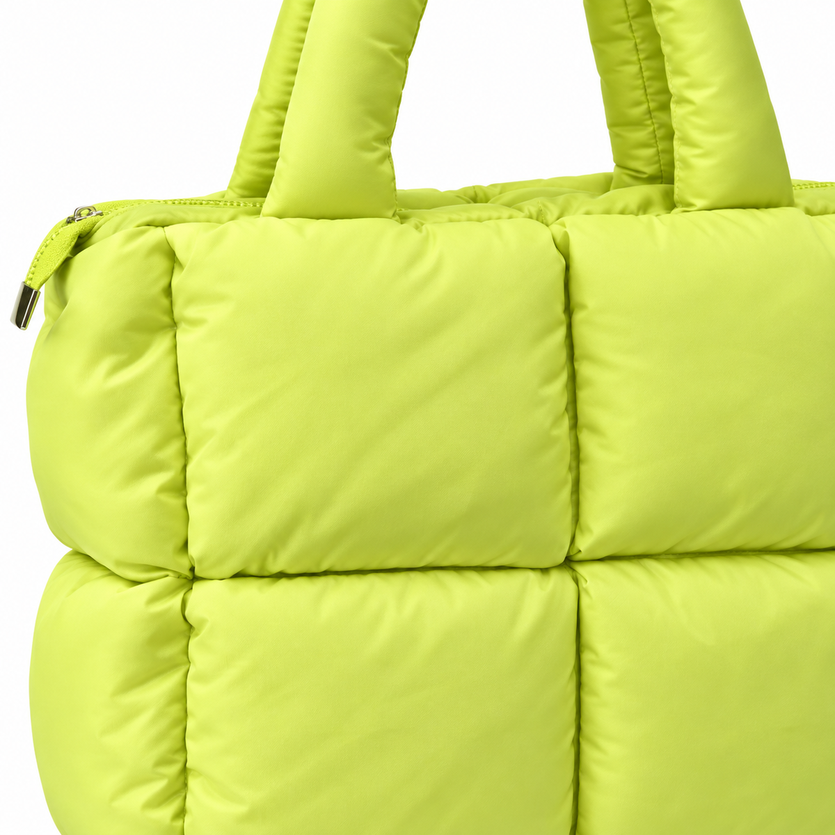 Close-up of Lime Mini Puffer Tote Bag showing bright lime green large-panel puffer quilted nylon texture and zippered top closure with gold zipper hardware and dual tubular puffer handles

