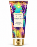 Front view of Orchard & Vine Blackberry Vanilla lotion showing colorful Christmas trees on purple packaging and the 6 fl oz label
