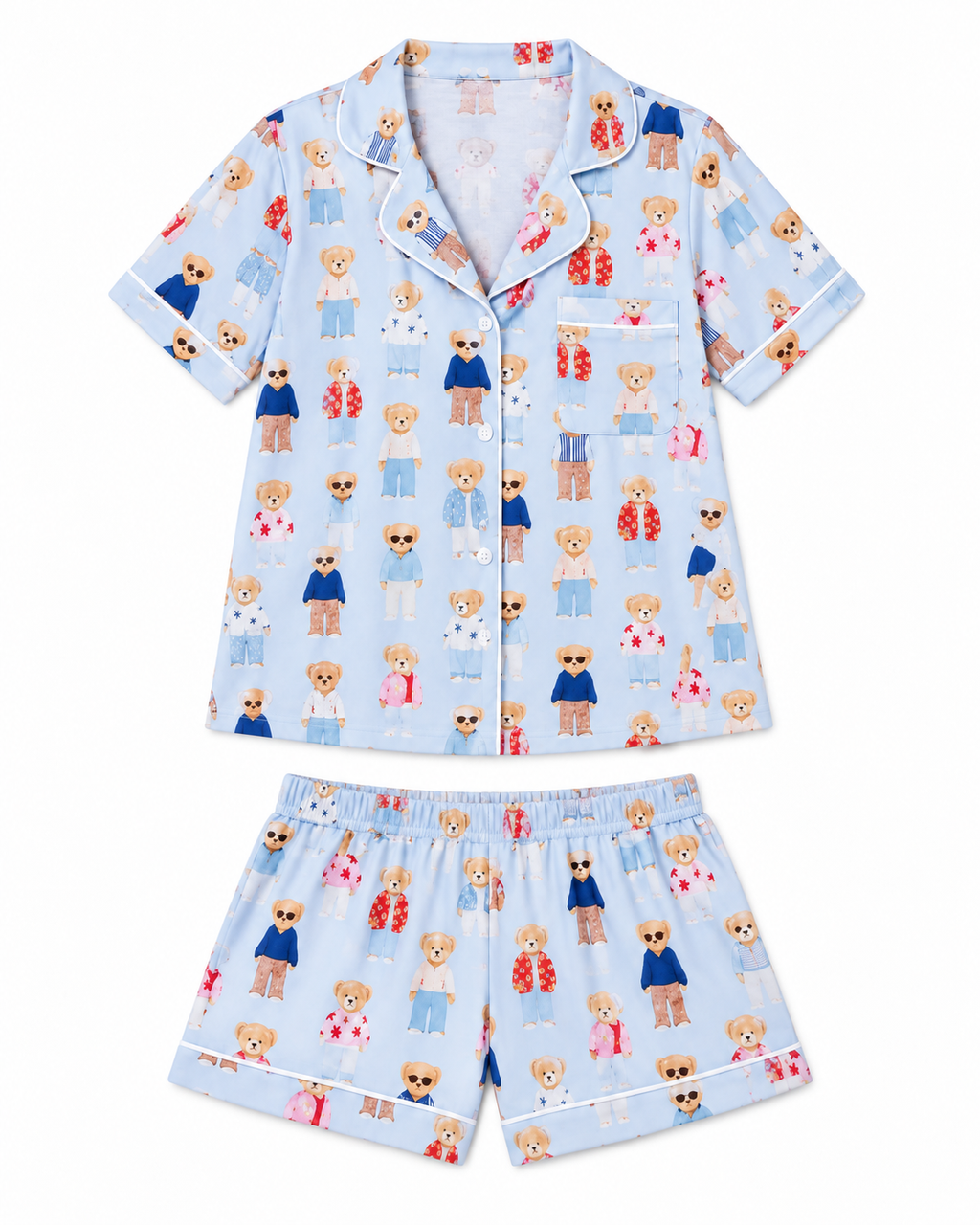 Teddy Bear Pajama Short Set flat lay showing light blue button-front short-sleeve top and matching shorts with all-over illustrated fashion teddy bear print and white contrast piping on collar, cuffs, pocket, and shorts hem on white background
