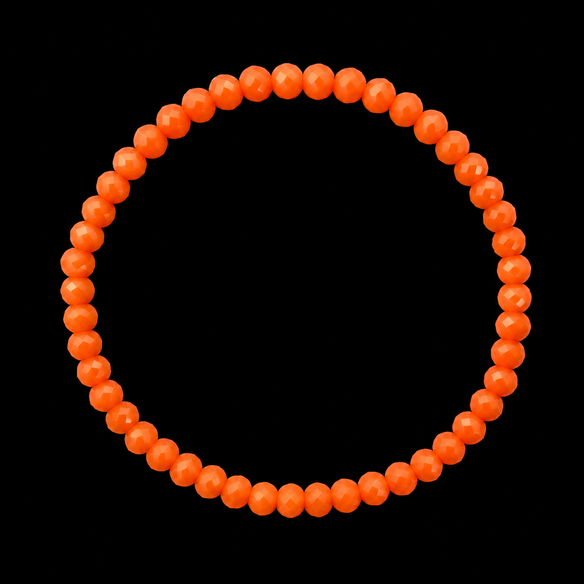 orange faceted rondelle bead stretch bracelet displayed flat in a circle on black background
