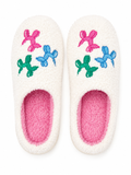 Ivory Balloon Dog Fuzzy Slippers flat lay showing colorful embroidered balloon dog accents in pink, blue, and green on ivory fuzzy exterior with bright pink interior lining
