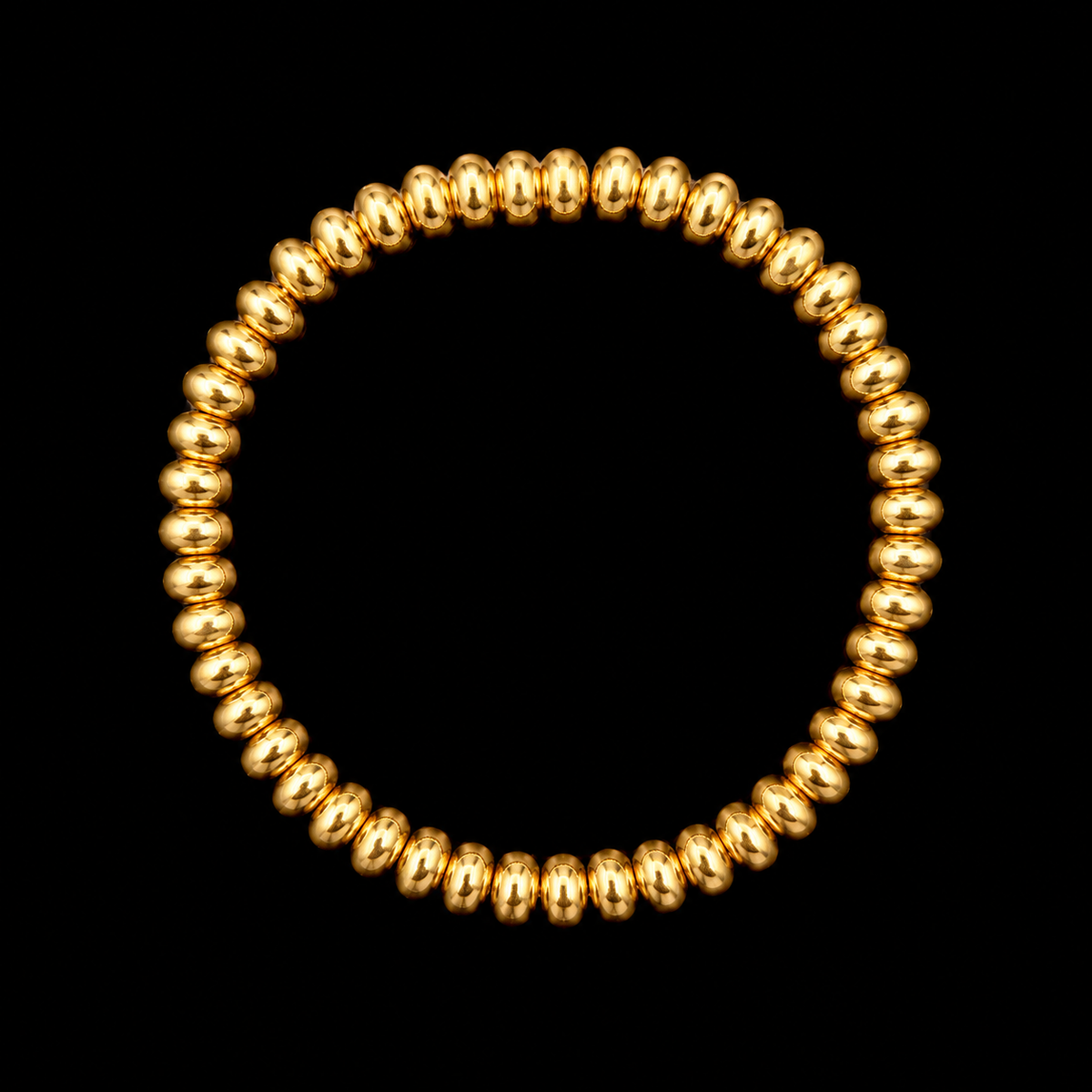 Polished gold-tone rondelle bead stretch bracelet displayed flat in a circle on black background
