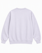 Back view of the light lavender sweatshirt showing its plain back, long sleeves, and ribbed cuffs and hem
