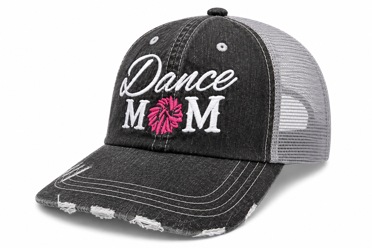 Side view of Dance Mom trucker hat in distressed black with gray mesh back and white embroidered lettering, shown on a white background.
