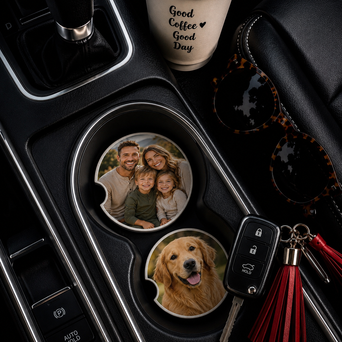 Two custom photo car coasters sitting in car cup holders showing a family portrait and a golden retriever, styled with sunglasses, car keys, and a coffee cup.
