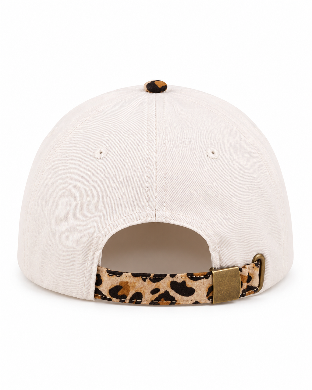 Back view of Salt & Vinegar Two-Tone Baseball Cap in Leopard showing cream cotton back panels with two small ventilation eyelets, leopard print top button, and leopard print adjustable back strap with antique brass slide buckle closure on white background
