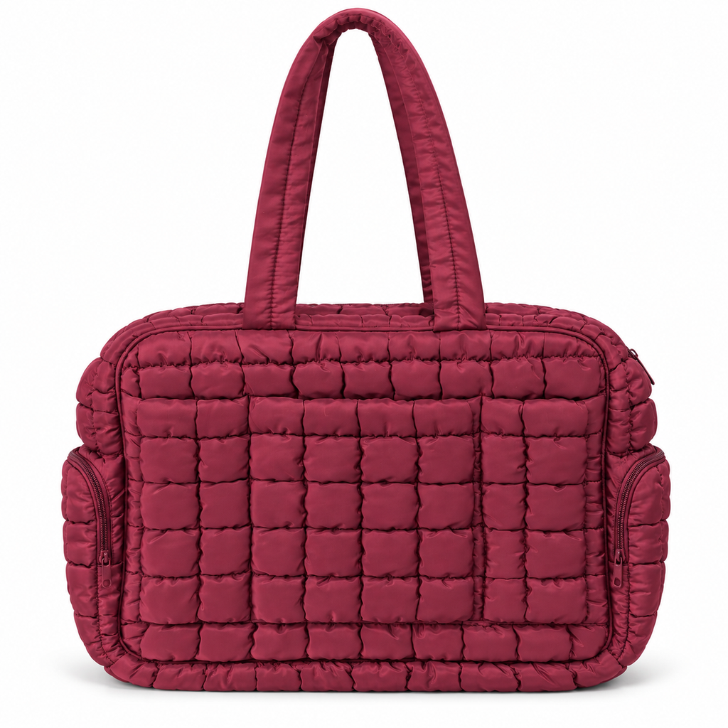 Wine Quilted Puffer Tote Bag front view showing rich wine burgundy puffer nylon with grid square quilted pattern, dual flat padded shoulder handles, zippered top closure, and side zippered pockets on white background
