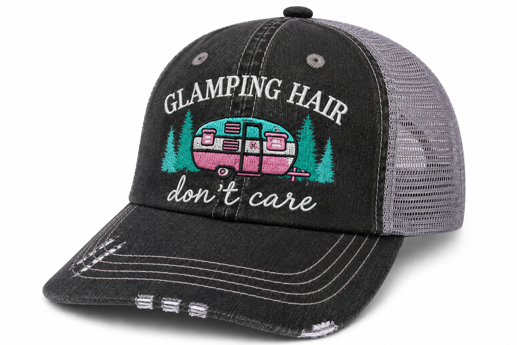 Side view of Glamping Hair Don't Care trucker hat in distressed black with gray mesh back and embroidered lettering, shown on a white background.
