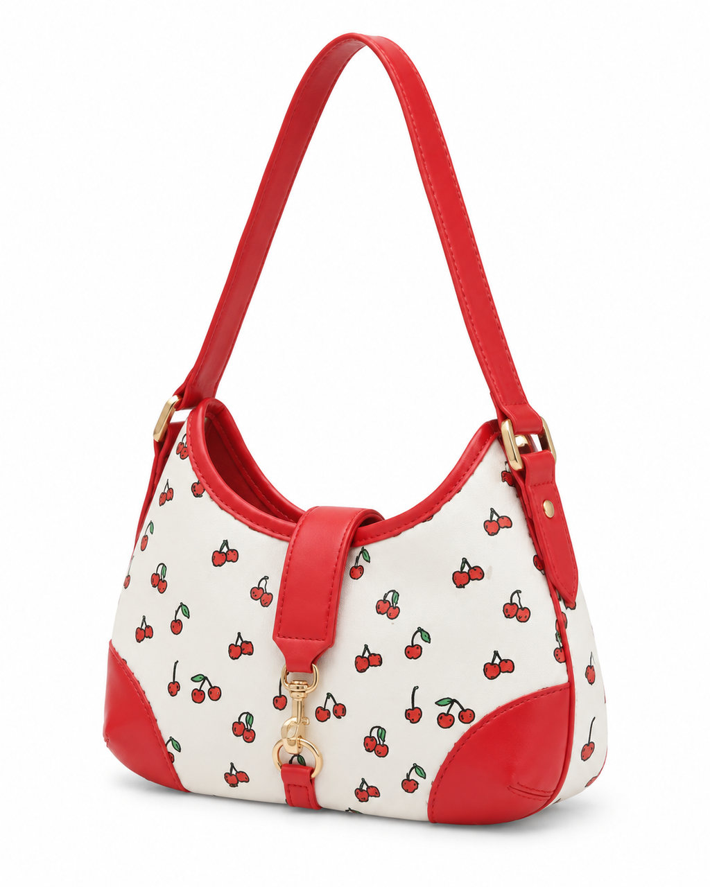 Cherry Pattern Hamptons Hobo Bag three-quarter angle view showing cream canvas body with allover red cherry print, crescent hobo silhouette with red faux leather trim along curved top edge and bottom corners, gold D-ring strap attachment, and single red faux leather shoulder strap on white background
