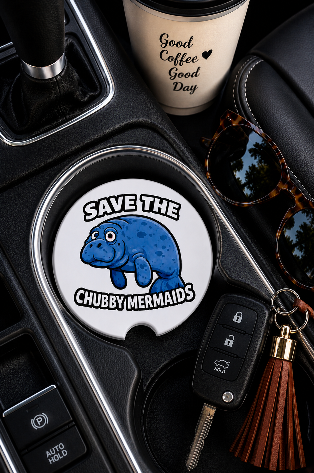 Save the Chubby Mermaids white ceramic car coaster in vehicle cup holder
