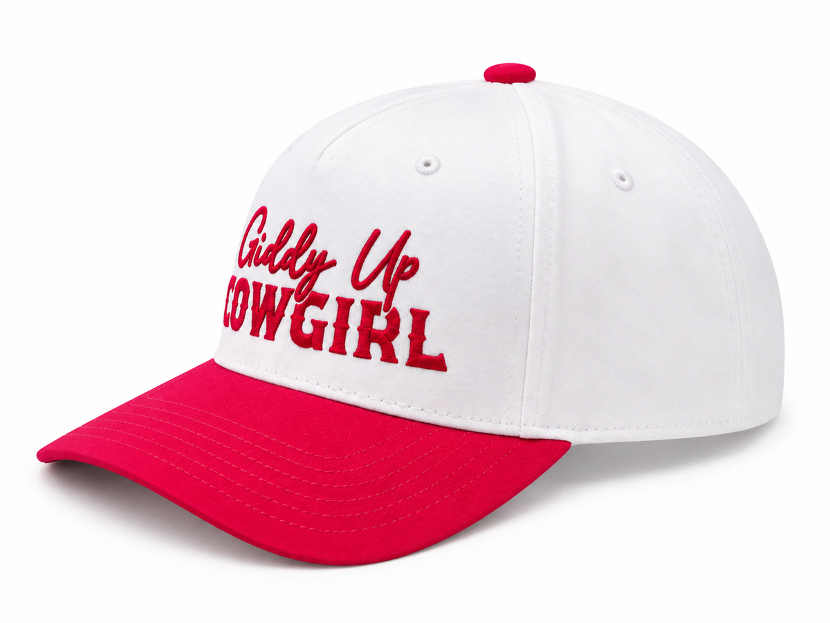Giddy Up Cowgirl Baseball Cap three-quarter angle view showing white structured crown, red bill, and red embroidered Giddy Up Cowgirl lettering on white background
