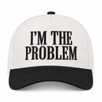 I'm the Problem Baseball Cap in Black front view showing cream cotton crown with black raised serif block I'm the Problem embroidery, solid black bill, and black top button on white background
