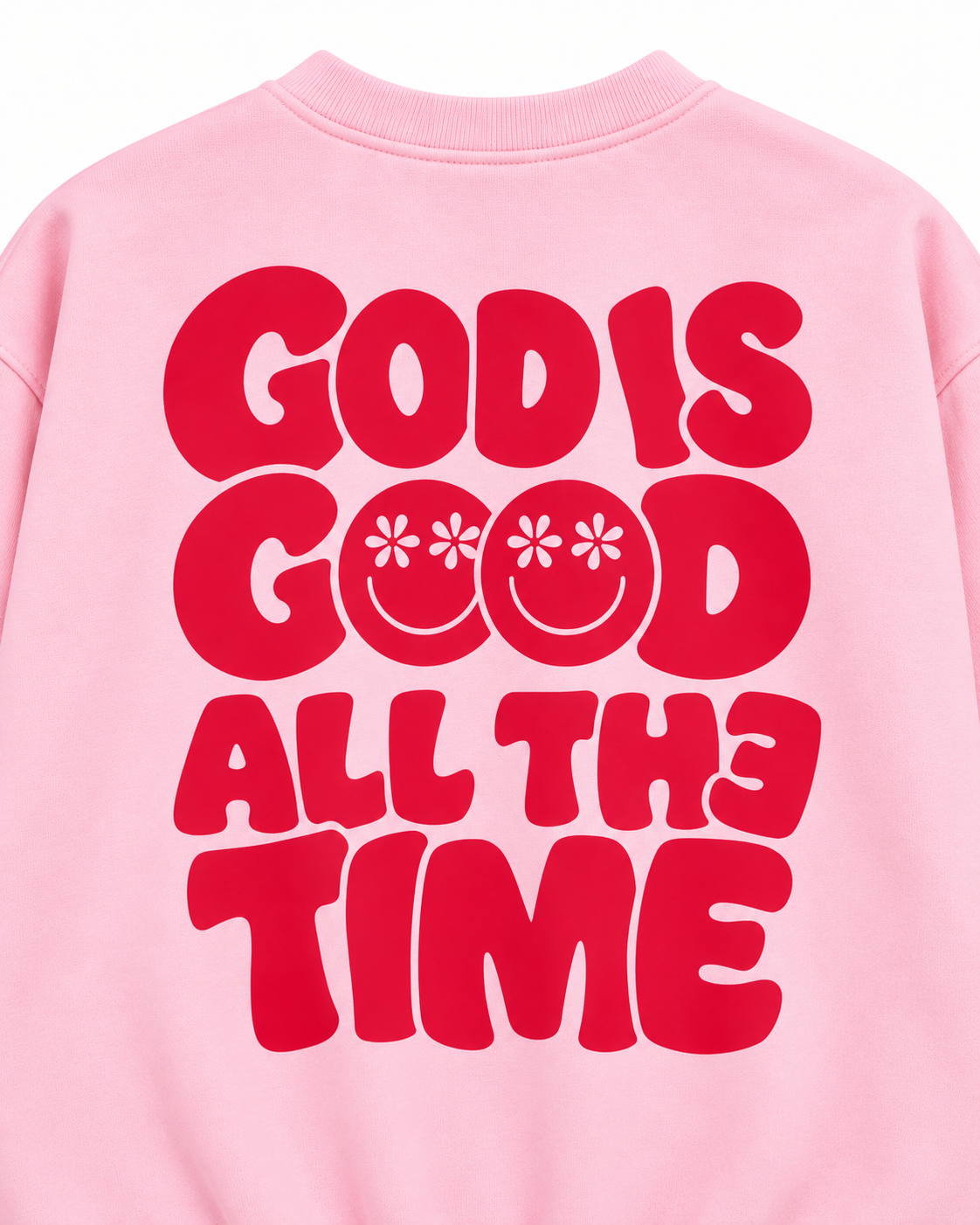 Close-up of the red God Is Good All the Time back graphic with two daisy-eye smileys forming the O's in GOOD
