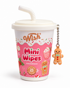 Front view of Wish Gingerbread Mini Wipes showing the pink Christmas cup, 25-count label, white straw-shaped lid detail, and gingerbread charm
