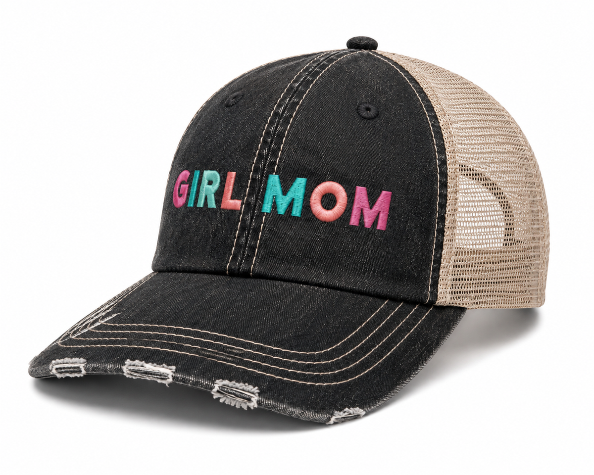 Side view of Girl Mom trucker hat with black distressed front, tan mesh back and colorful embroidered lettering