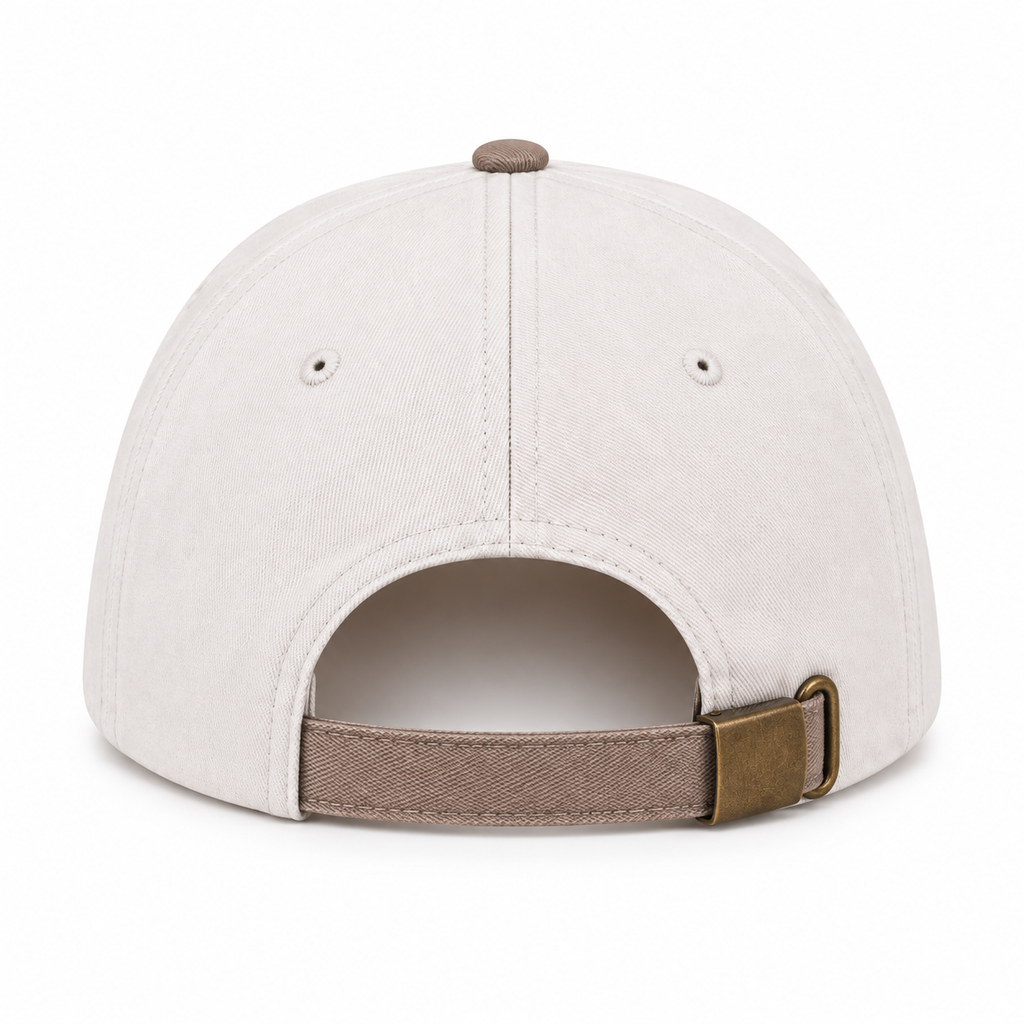 Back view of He Is Risen Baseball Cap in Ash Mocha showing cream cotton back panels with two ventilation eyelets, mocha top button, and mocha adjustable back strap with antique brass slide buckle closure on white background
