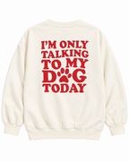 Full back view of the cream sweatshirt with red I'm Only Talking to My Dog Today lettering and a paw print replacing the O in DOG
