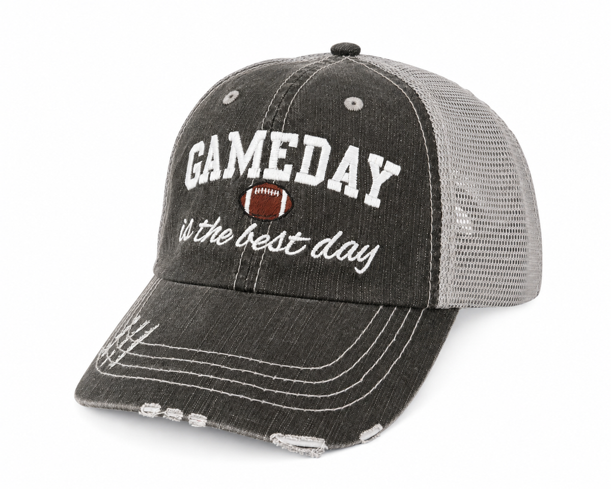 Gameday Is the Best Day distressed charcoal trucker hat with gray mesh back, angled view
