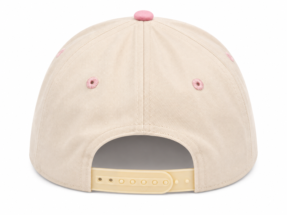Back view of I'm Nicer When I'm Tan trucker hat showing solid cream back panels and adjustable snapback closure, on a white background.
