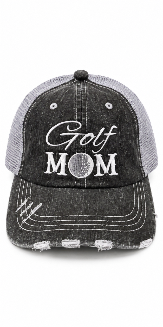 Golf Mom Trucker Hat front view with distressed black structured front, gray mesh back, and white embroidered Golf script with Mom block lettering and embroidered golf ball detail on white background
