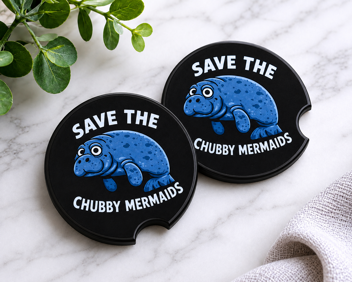 Save the Chubby Mermaids black car coasters featuring a cartoon manatee