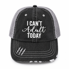 A distressed trucker hat with a black washed denim front panel and brim, gray mesh back, and white embroidered text reading 'I CAN'T Adult TODAY' on the front.