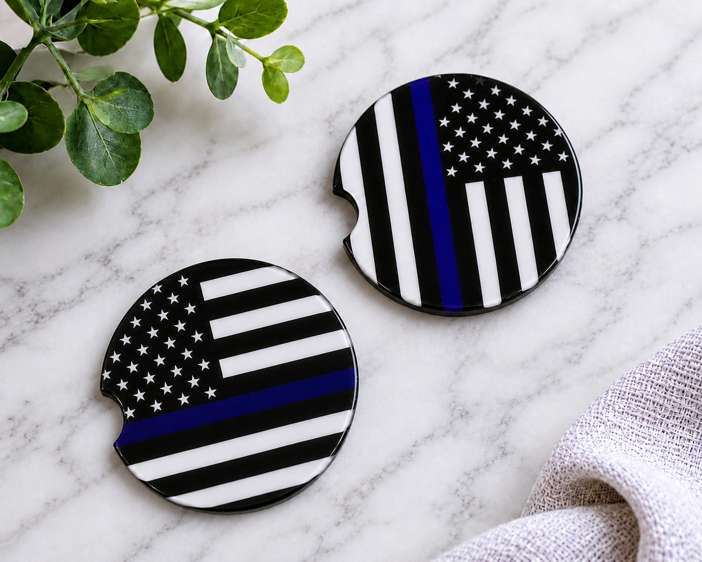 Thin Blue Line car coasters with black and white American flag and blue stripe design
