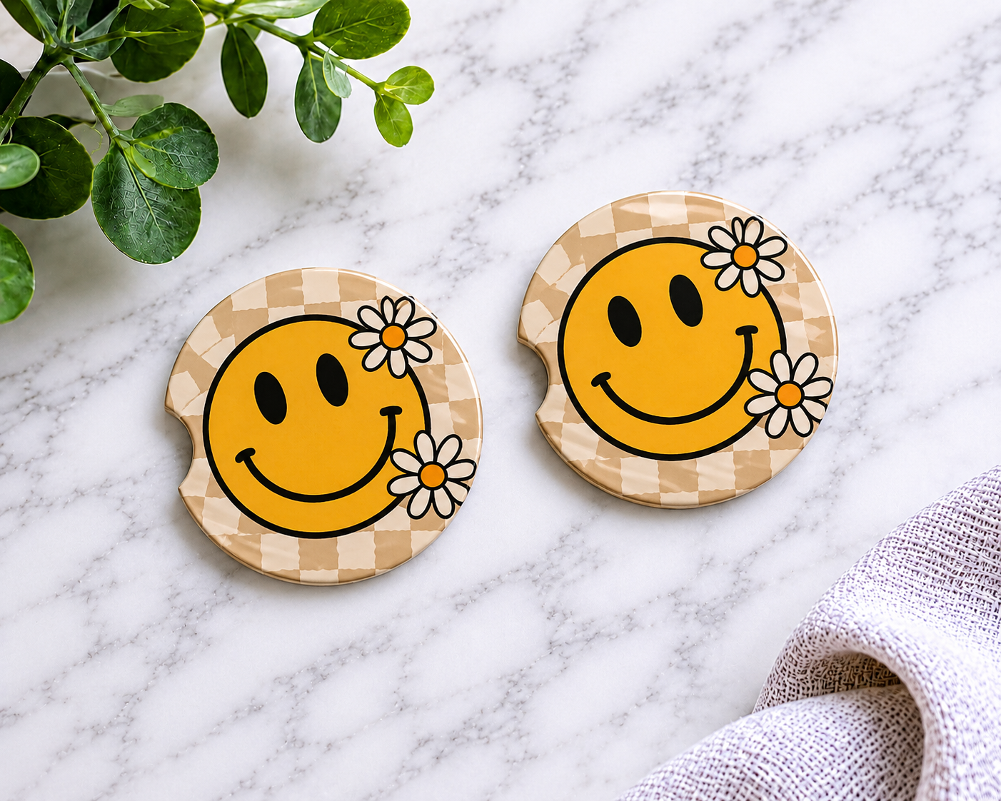 Smiley Face Daisy car coasters with retro yellow smiley and checkered background design