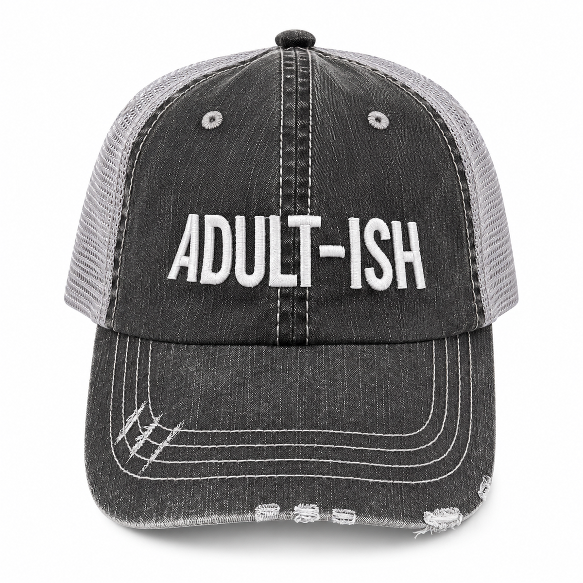 A distressed trucker-style baseball cap with a dark gray washed denim front panel and brim, and light gray mesh back panels. The front features the word 'ADULT-ISH' embroidered in bold white capital letters.
