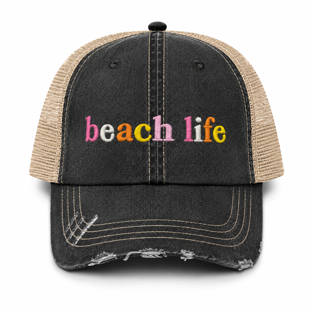 Beach Life trucker hat in distressed black denim front with multicolor embroidered lettering and tan mesh back, shown on a white background.
