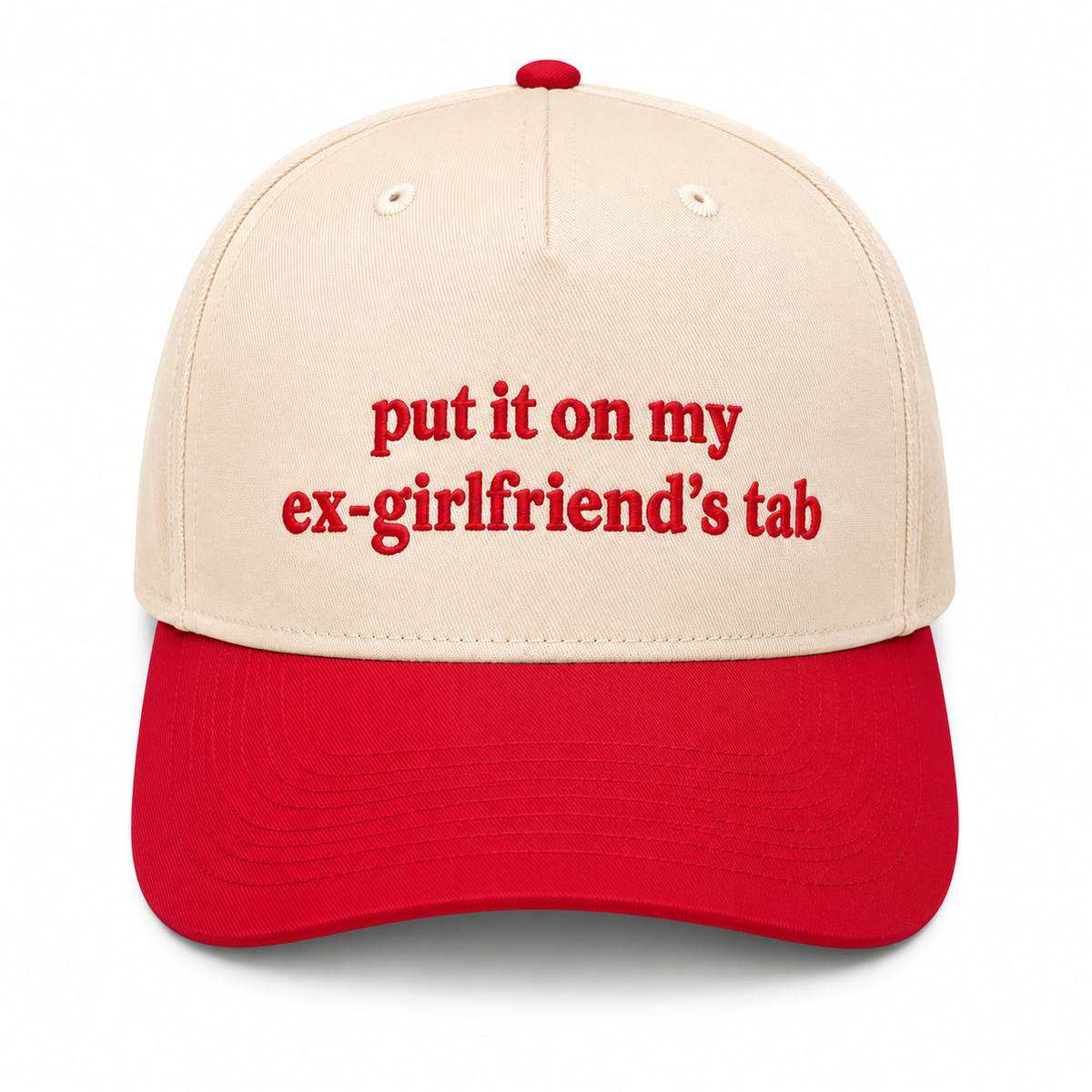 Put It On My Ex-Girlfriend's Tab Baseball Cap in cream crown with red brim and bold red embroidered lettering, shown on a white background.

