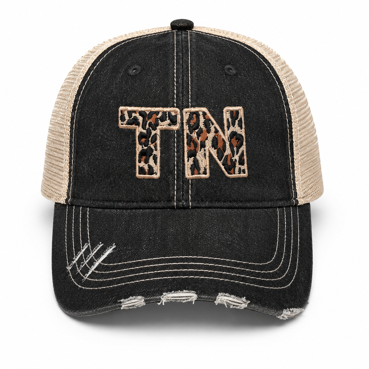 TN Leopard Print trucker hat in distressed black denim front with bold leopard print TN embroidery and tan mesh back, shown on a white background.
