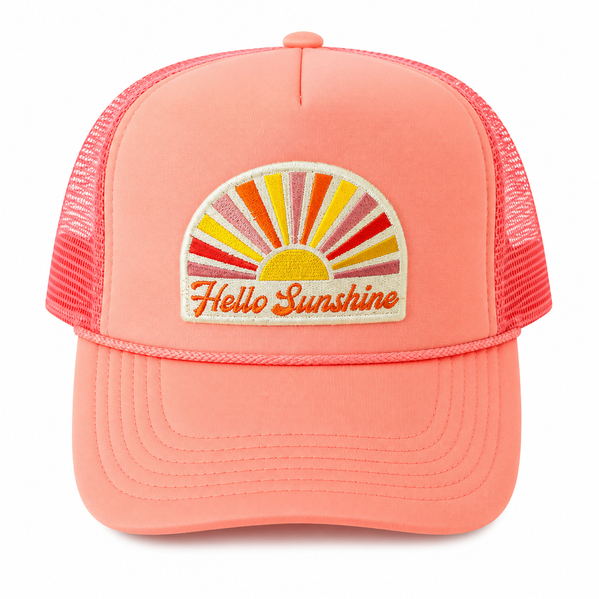 A coral pink trucker hat with a mesh back and a front patch featuring a colorful sunburst and the embroidered text 'Hello Sunshine'.