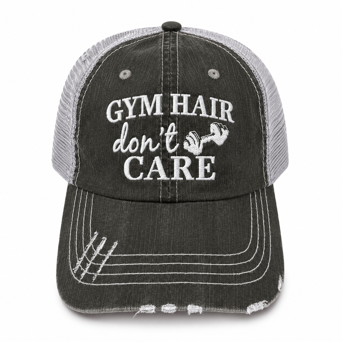 A distressed trucker-style baseball cap with a dark gray washed denim front panel and brim, and light gray mesh back panels. The front features white embroidered text reading 'GYM HAIR don't CARE' alongside a small dumbbell graphic.