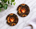 Sunflower Tooled Leather car coasters with dark amber scrollwork and glowing sunset medallion design